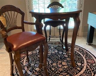 Pub Table with 2 chairs $280
73” Round Rug $80