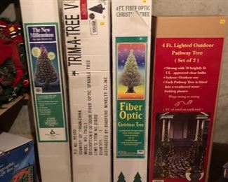 4 Brand new Christmas Trees in original
boxes!