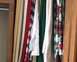 Closet full of vintage table clothes!