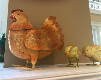 Small family of chickens still mourning their patriarch who fell victim of Church's