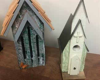 birdhouse on the right appears to be fraught with despair