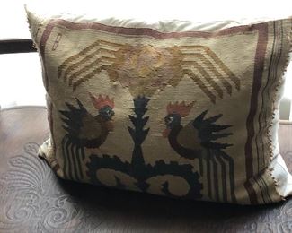 grest kilim pillow on top of antique bench