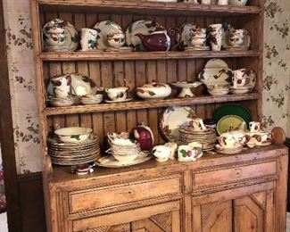 Welsh dresser with hundreds of pieces of Franciscan Apple dinnerware