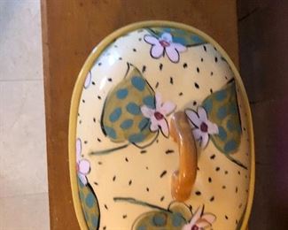 beautiful covered pottery piece