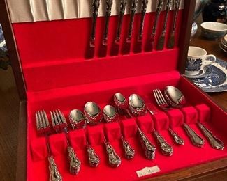 Mint condition, stainless flatware.