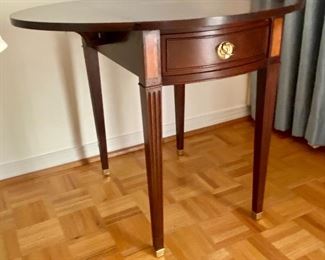 46- Mahogany Federal side table tapered legs brass tip, single drawer 31”L x 24”T x 24”D $195