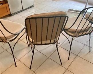 54- $200 Four iron chairs