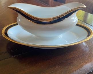 Rare & very hard to find. Tiffany & Co Gold Leaf Black Band Dots Gravy Boat with attached bottom in like new condition.  Pattern # TIC41.  Made in Limoges France.       $50.00