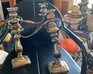 Antique pair Candelabra  14" high x 17" wide.  They appear to be silver over copper.  One of the candelabras is bent