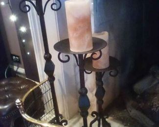 Beautiful and unique is this set of 3 wrought iron candle holders. Tall and heavy. Very well made.  30",  24",  18" tall.  Fabulous condition!  $25.00