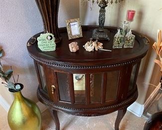 Antique oval shaped curio, Butler Tea Cabinet. 