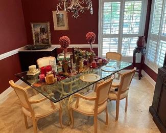Glass top dining room table and chairs - "not for sale" all other contents on table are available. 