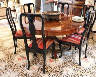 Custom flame mahogany dining table
