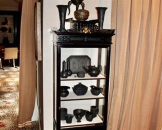 Ebonized cabinet with bronze griffin detail