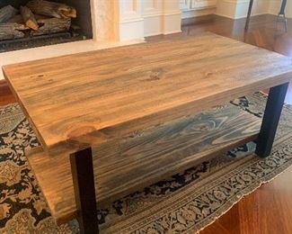 Rustic industrial-look wood/metal coffee table