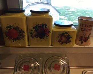 Yellow flowered canister set (3 pcs) has wooden lids;  glass kitchen caddy for utensils 