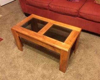 Coffee table with glass inserts