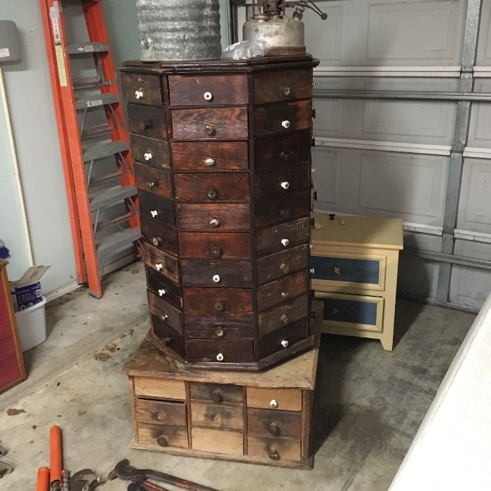 This is awesome!!! Antique spinning hardware drawer tower with all 96 drawers (and all pulls for the top!)