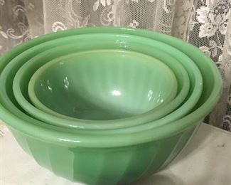 Set of four jadeite fire king mixing bowls