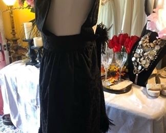 “Grace” Style 1067, Black Popular Style with Feathers. Sample Size 2, Retail $1,100.