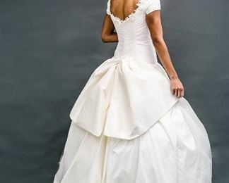 Colette, #1096, size 4, white elongated bodice / cap sleeve gown, $3,119.