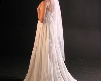 Gwenith, Umpire lace bodice bias cut gown with attached pleated train, $1,825