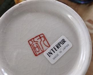 artist mark on vase urn