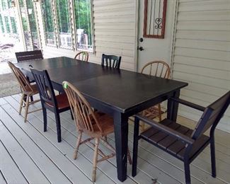 Pottery Barn table with two additional leaves sits 6 - 10.  Assorted chairs