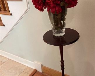 Wood pedestal table,  beautiful glass vase with flowers