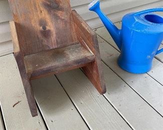 Child's wood chair, watering can