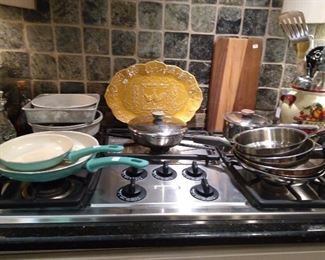 Non stick frying pans, teak cutting board, platter, stainless steel frying pans