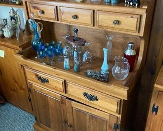 Find glassware displayed on Pine Dry sink