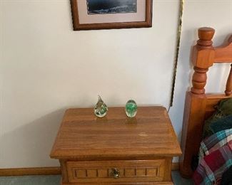 One of two cherry bedside tables