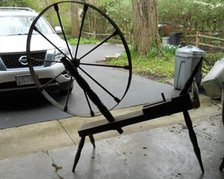 antique primitive spinning wheel