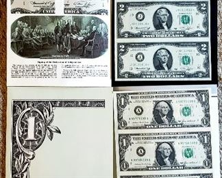 Uncut $1. & $2. bills bought at auction