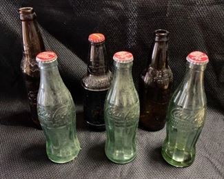 3 Coke Bottles and 3 Other Glass Bottles