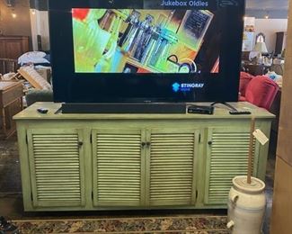 Large Vintage Green 4-Door Solid Wooden Cabinet, (Length 87" x Width 24.5" x Height 37.5") and a 75" SPECTRE (4K UHD) TV