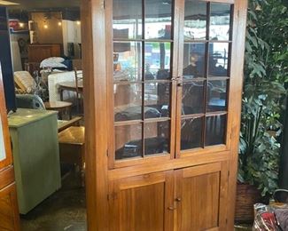 (c. Late 1800's) SOUTHERN RAILWAY SYSTEM (with S.R.S. orig. tag on back) Large Walnut Corner Cabinet, 16-pane glass front doors with wooden latches and interior wooden shelves (Height 96" x Width 46" x Depth 21")