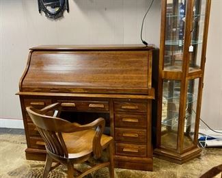 "JASPER CABINET CO."  Oak Roll Top Desk with 9 Drawers and Matching Chair and a Lighted Mahogany Curio Cabinet 