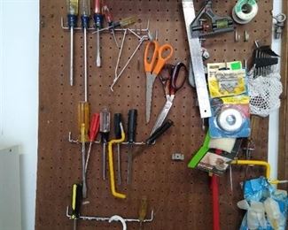 Peg board W/ screwdrivers, Allen wrenches, level square, wire cutter, & pipe cutter