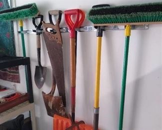 (2) push brooms, (3) shovels, snow shovel, pitch fork & hand saw
