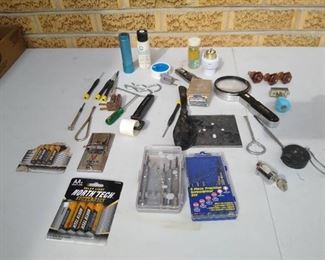 Precision screwdrivers, flashlight, pocket knife, hardware