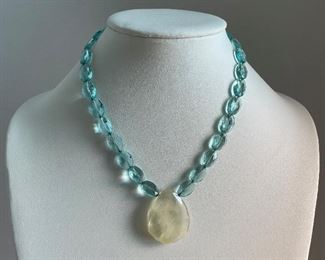 blue crystal necklace - around 18 inches in length - price 40 dollars