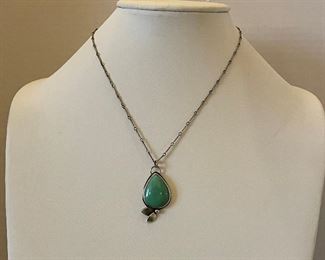Sterling silver and green stone necklace - 17 1/2 inches in length - price 150 dollars - one of a kind piece - bird symbol makers mark