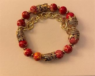 red chain bracelet - stretch - price 5 dollars