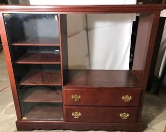 Java cherry colored entertainment center. Holds 32" TV.