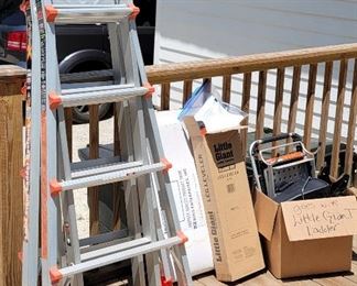 Little Giant Extreme Ladder System (New)  Includes: Little Giant Ladder, extends 11 - 19 feet, Work Platform, Air Deck (handrail),  Wall Standoff, Fuel Tank (paint), Trestle Bracket, Leg Leveler, Rack (to hang ladder), Written instructions and DVD.
