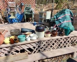 Collectible jugs, planters etc.  Lounge chair and stackable outdoor chairs too.