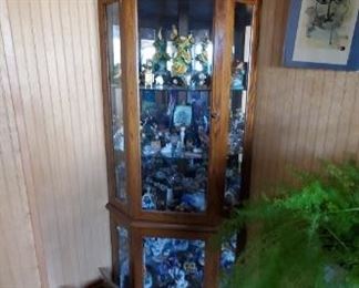This cabinet is not for sale but all the items on top and inside are.  Mini clocks, porcelain shoes and ceramic items for decoration. 