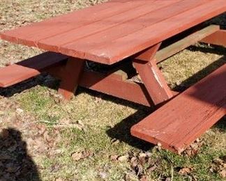 Picnic tables with benches.  